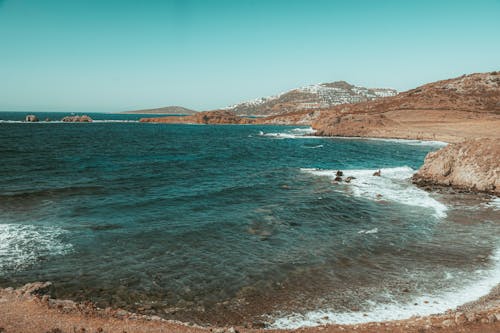 Бесплатное стоковое фото с вода, волны, гора