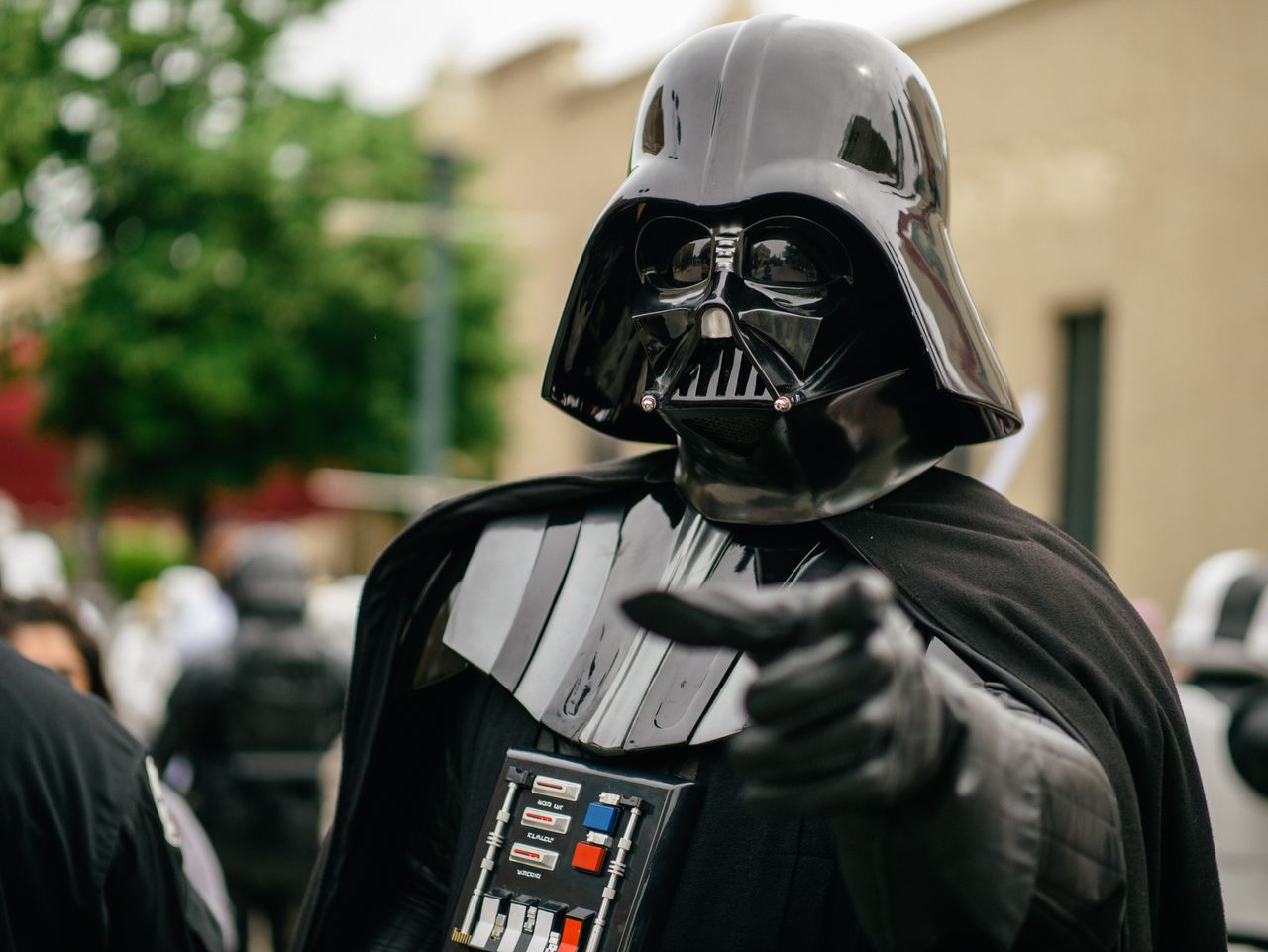 darth vader cosplayer pointing in an outdoor setting showcasing detail