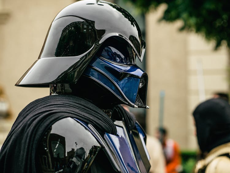 A Cosplayer In Darth Vader Costume