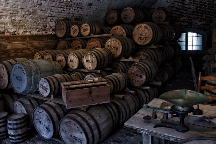 Brown Wooden Barrels In Wine Cellar