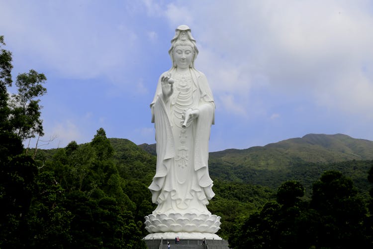 Statue Near Mountains