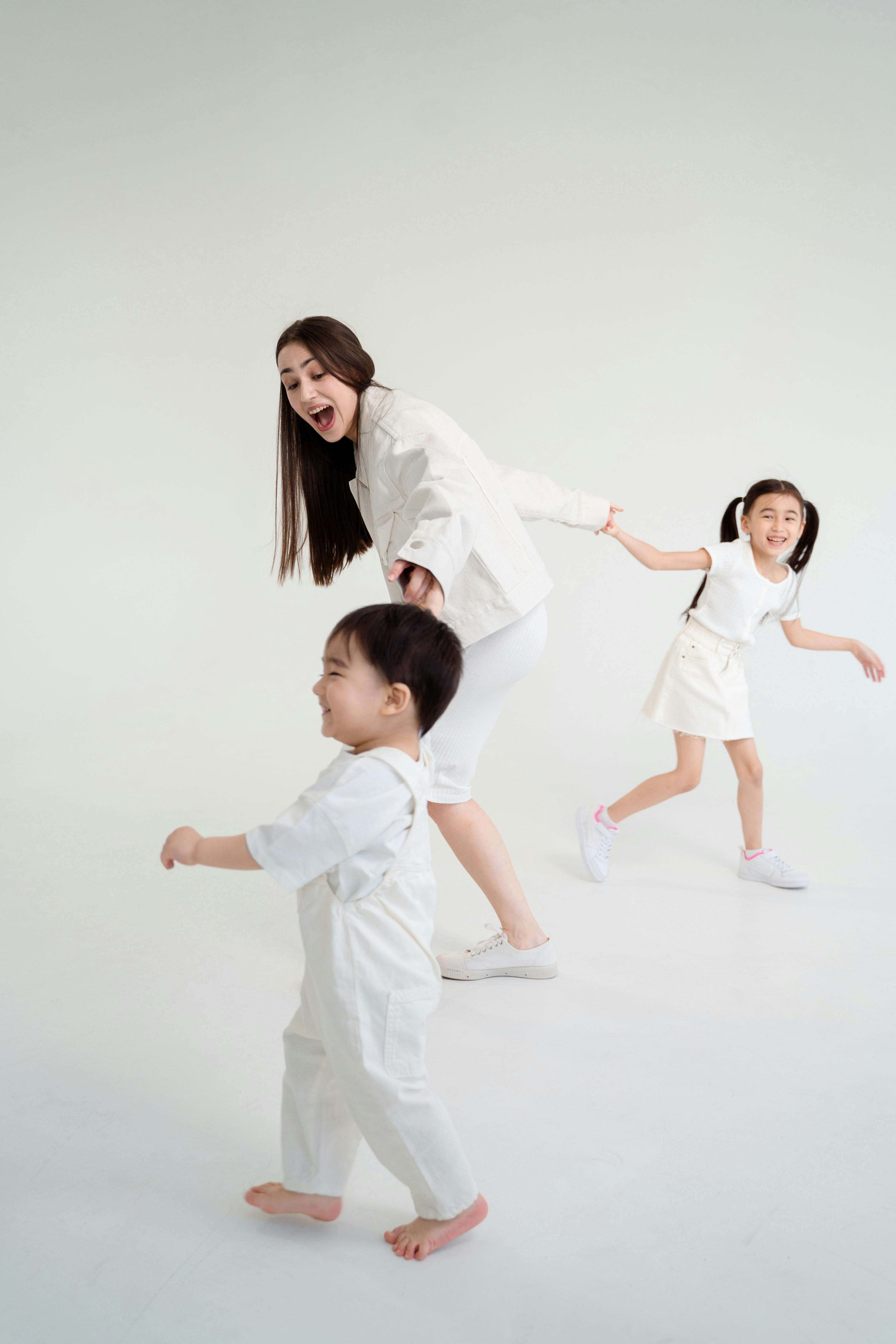 girl in white dress shirt and girl in white dress shirt