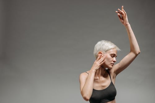 A Woman Posing with Her Eyes Closed