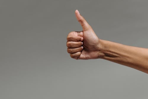 Free A Person Doing a Thumbs Up Stock Photo