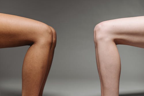 Close-up Shot of People's Legs