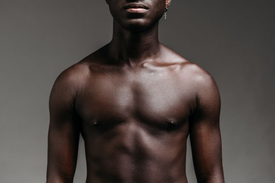 Male torso showing flank and chest areas targeted during liposuction contouring for men in Mumbai