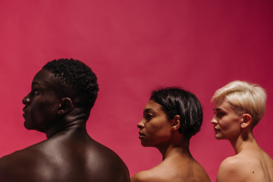 Artistic profile portrait of three diverse individuals against a bold red backdrop.