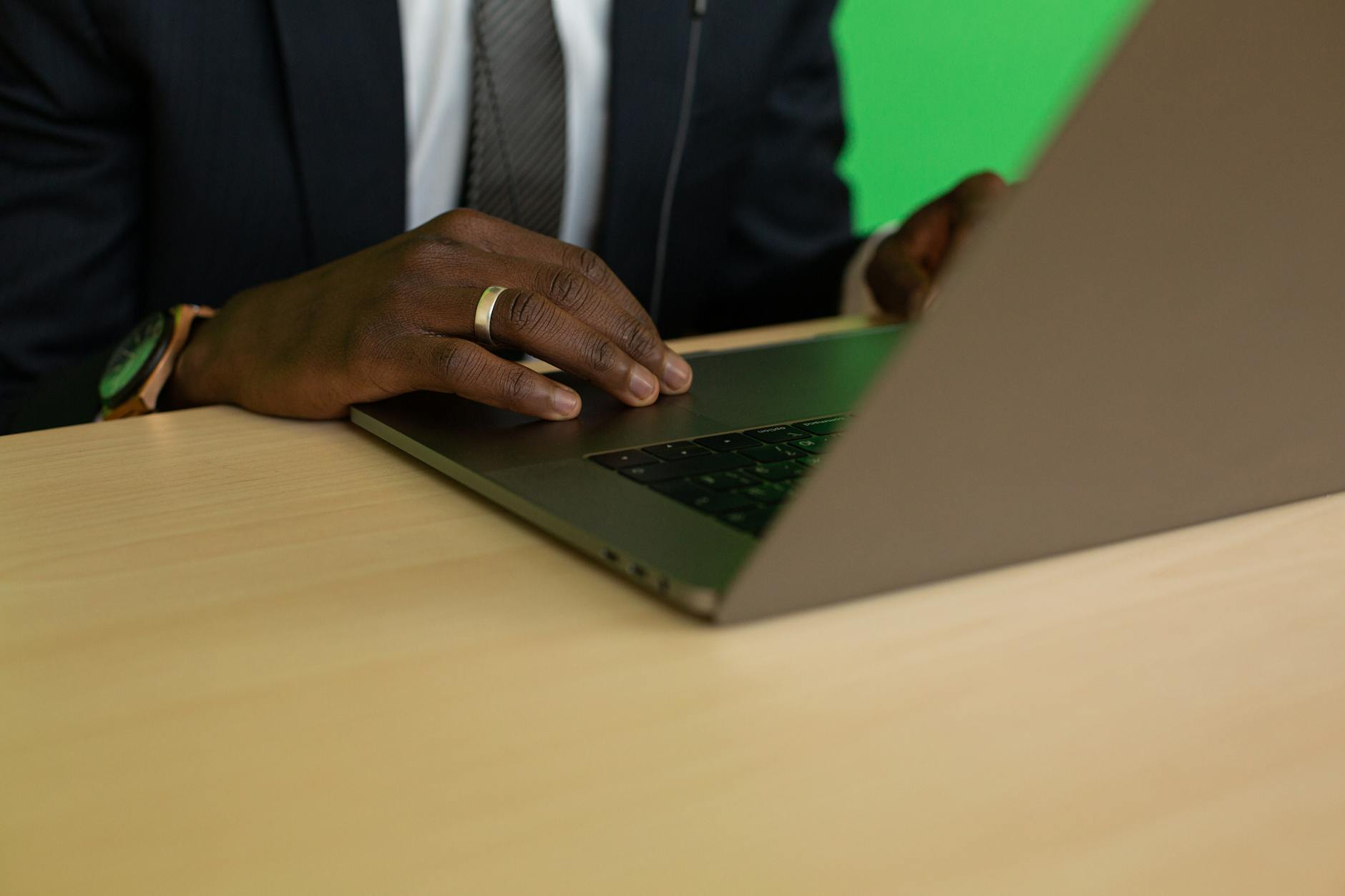 Close-up Photo of Person using Laptop
