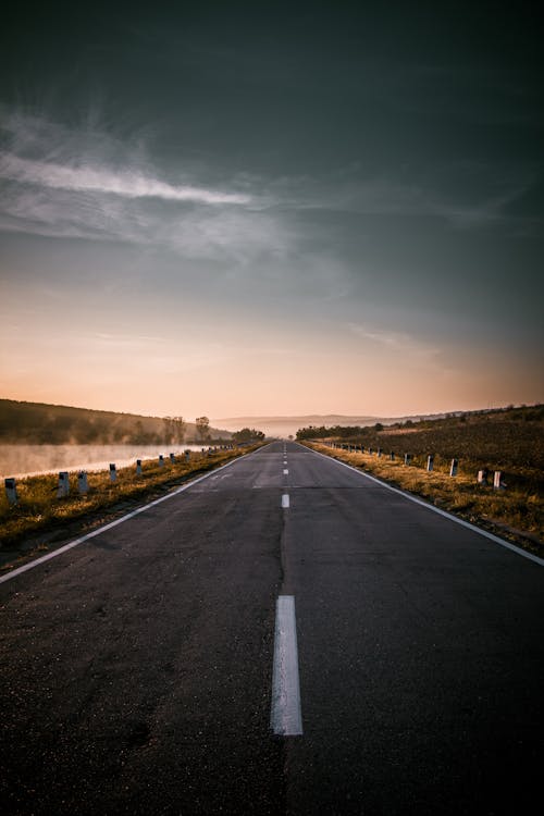 Asphalt Road Under Gray Sky