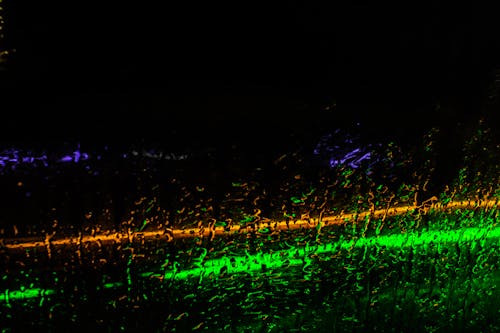 Colorful Lights through Wet Glass