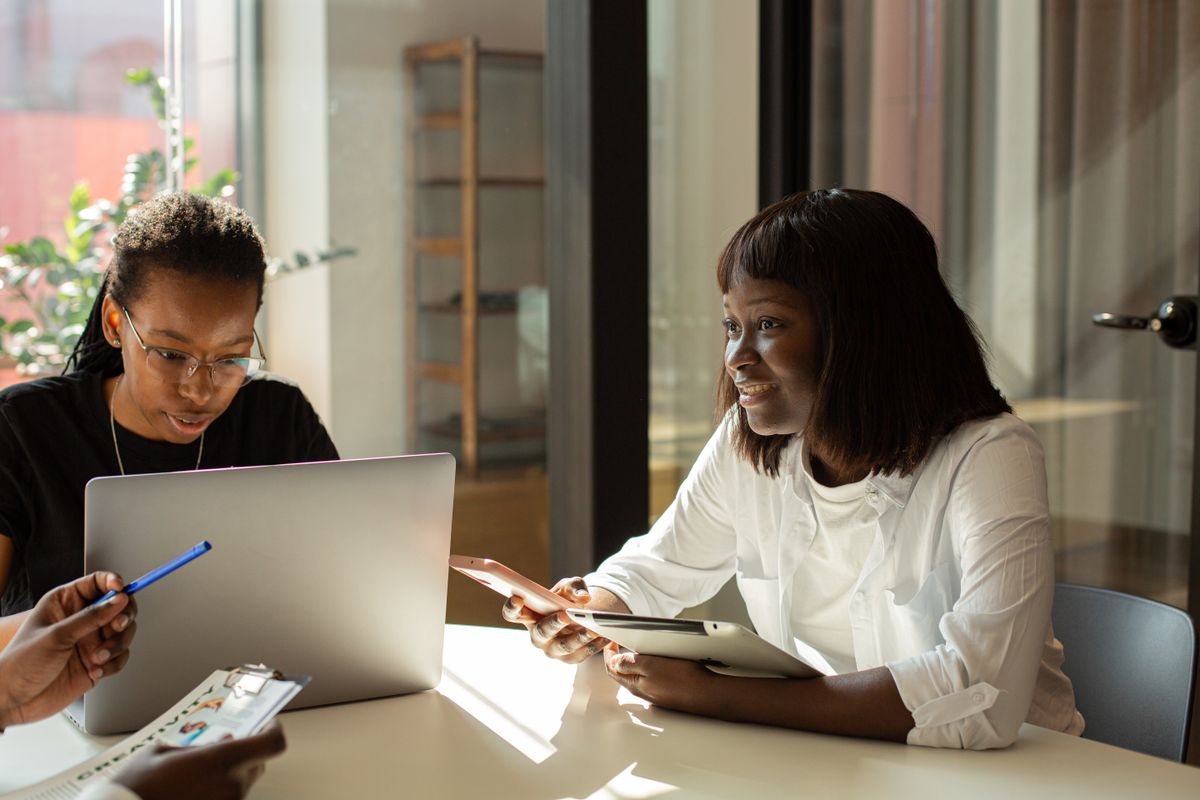 Professionals collaborating in meeting