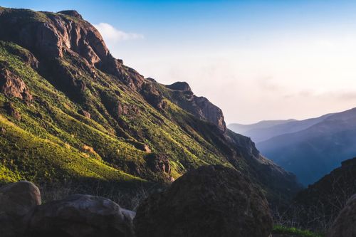 Free Explore the stunning vistas of Malibu's rolling mountains under a bright blue sky. Stock Photo