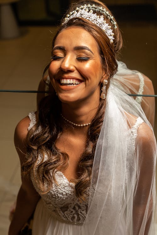 Free A Beautiful Bride Smiling Beautifully Stock Photo
