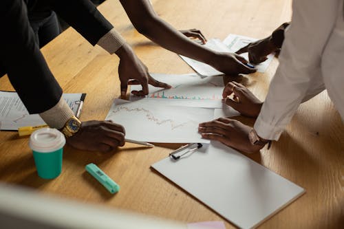 Colleagues pointing on Documents 