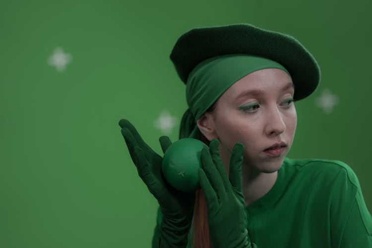 A Woman Wearing Green Outfit