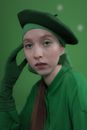 Woman in Green Long Sleeve Shirt Wearing Green Hat