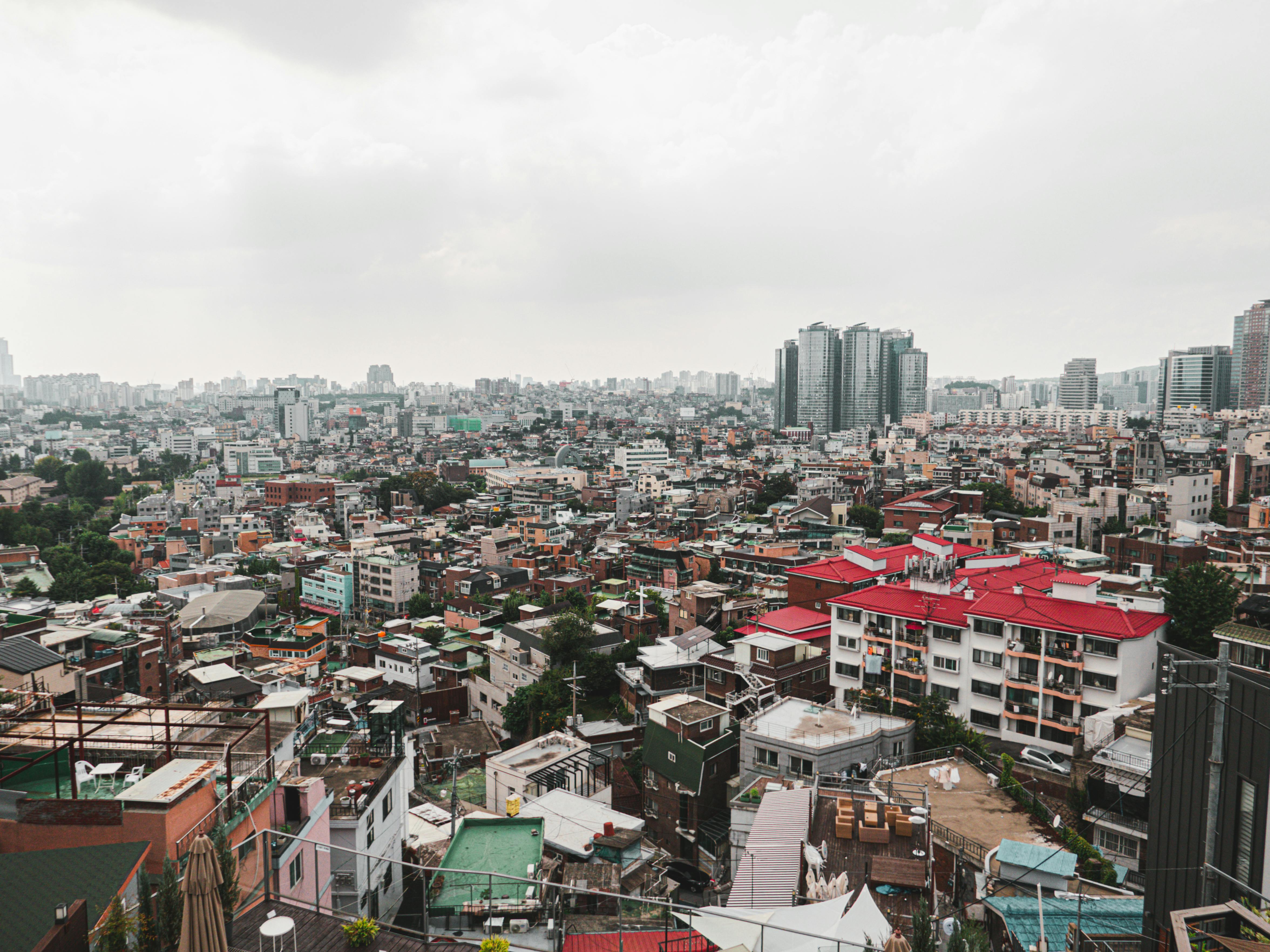 Expansive view of urban Hongcheon-gun, showcasing mixed architecture under cloudy skies.