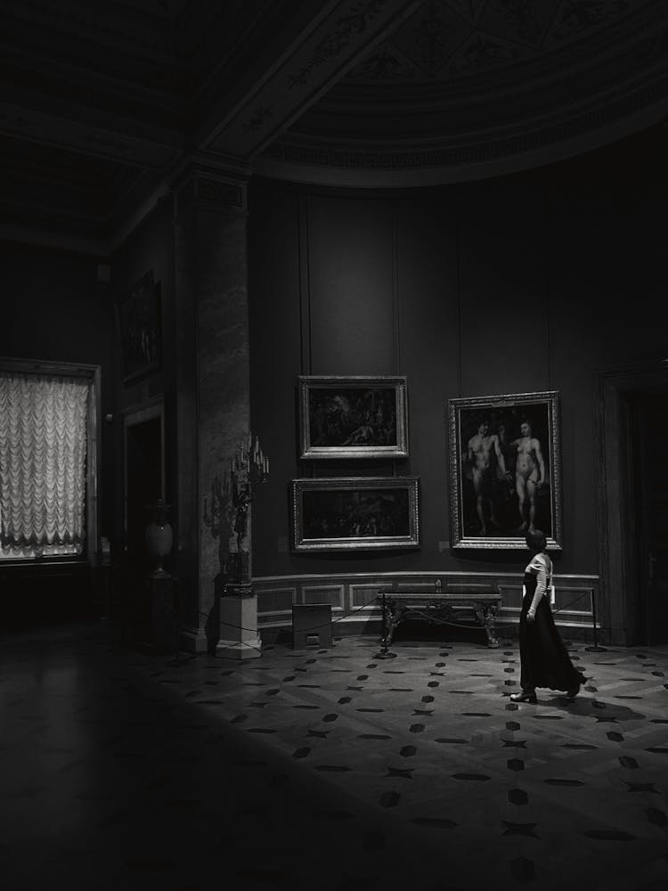 Woman Walking In Museum Room