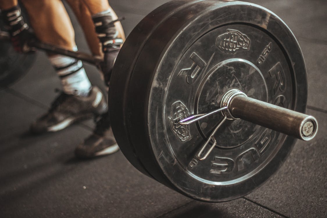 Free Person Lifting Barbell Stock Photo