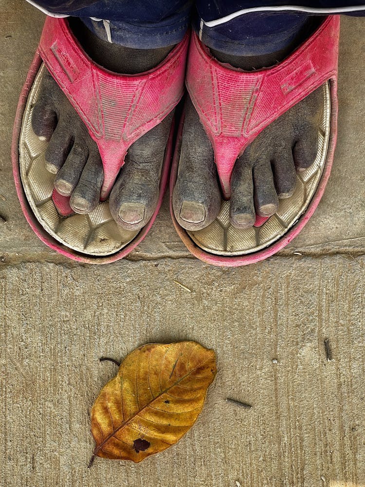 Men Feet In Flip Flops