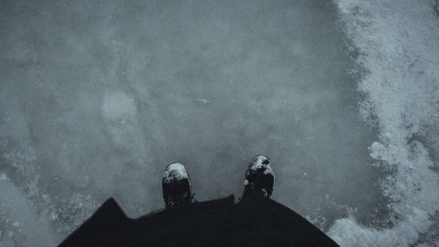 High Angle View of Snow Covered Shoes