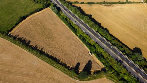 Gratis stockfoto met asfaltweg, bomen, dronefoto