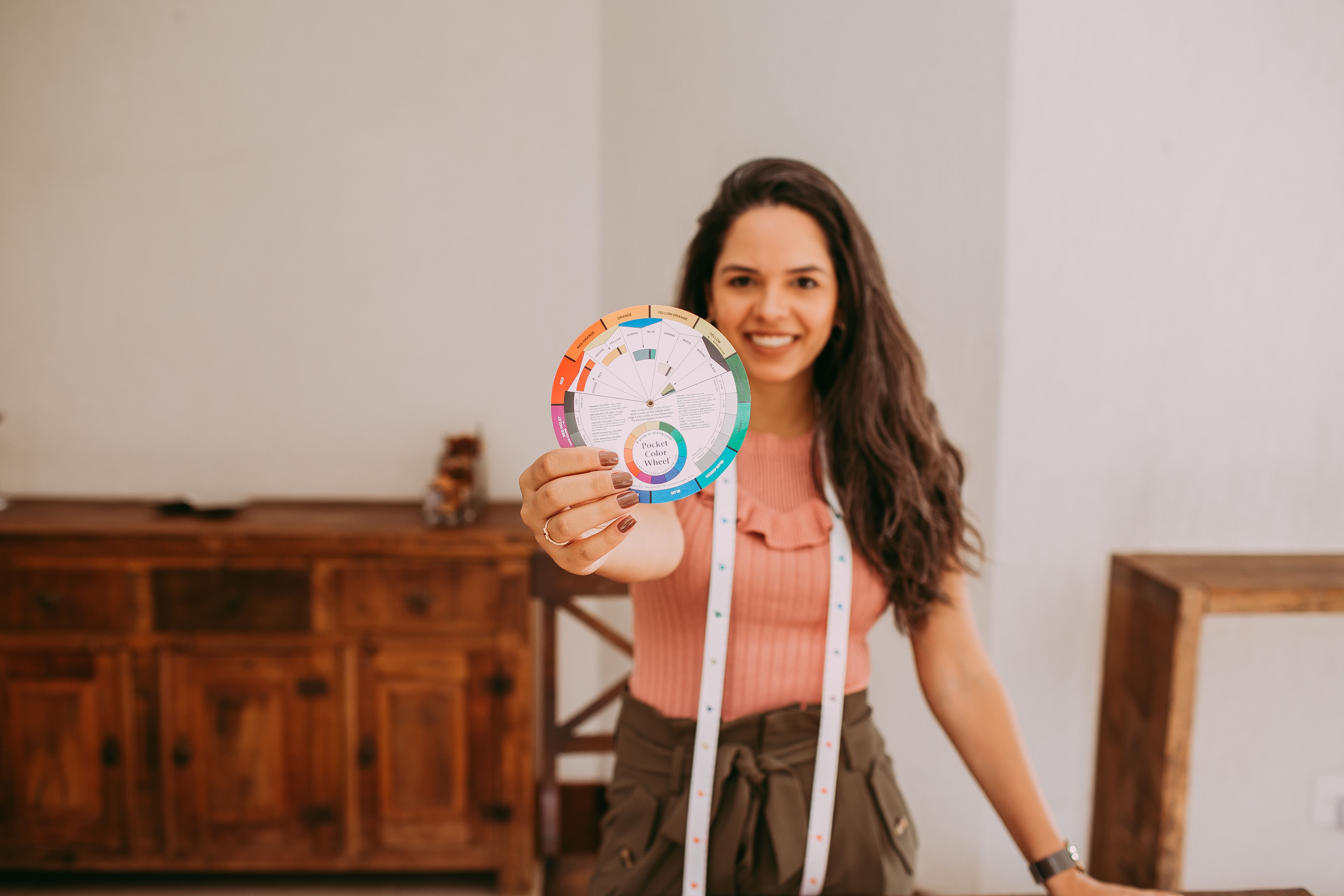 Woman Holding a Color Palette with Two Hands · Free Stock Photo