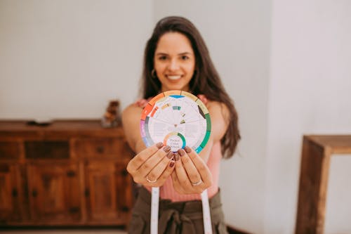 Woman with Color Wheel in Hands