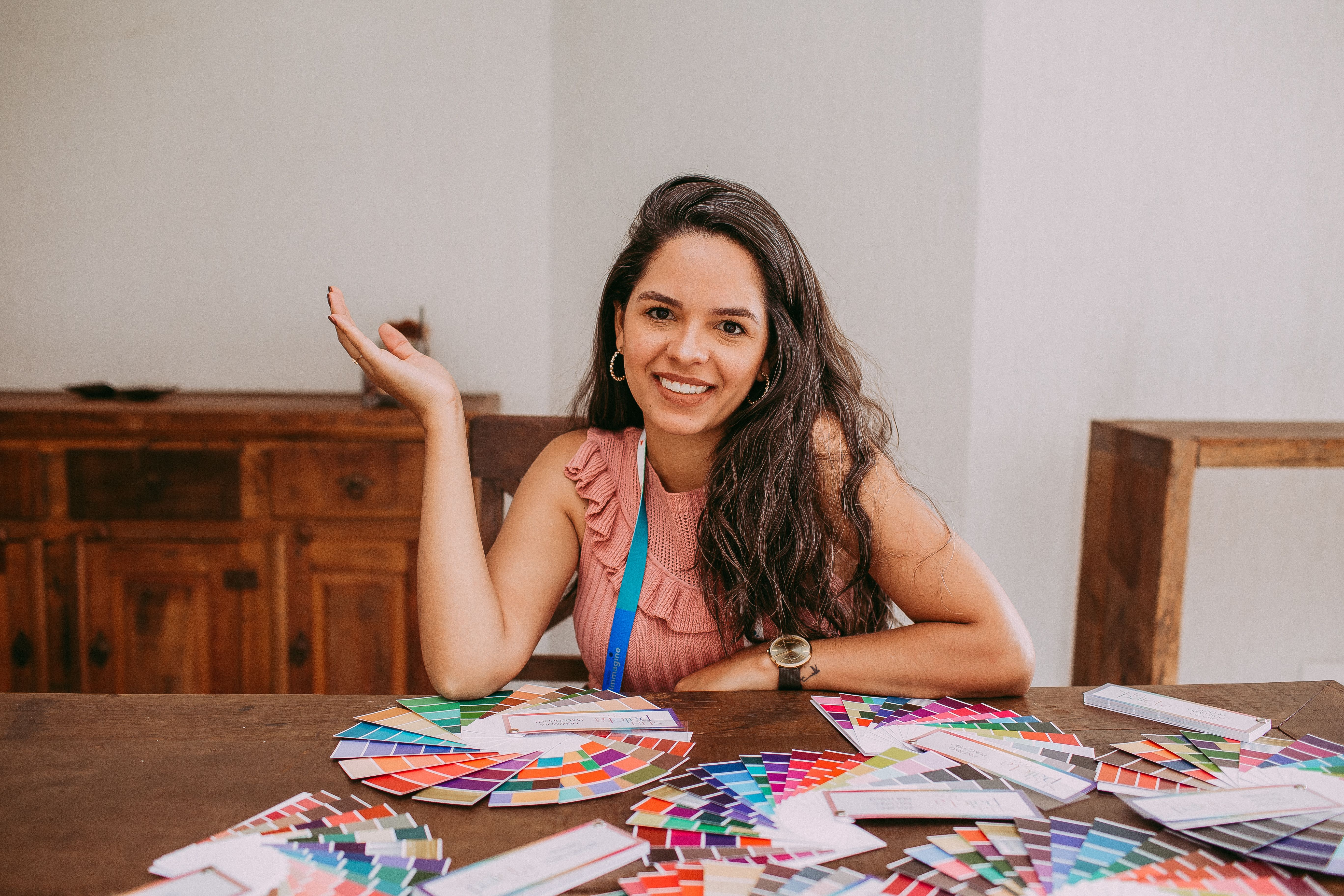 Woman with spring colour samples — best colours for women over 60 spring 2026