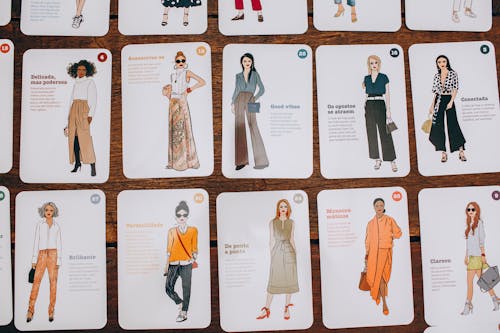 Cards with Fashion Illustrations on Table