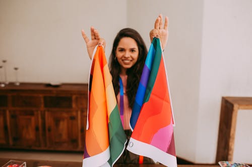 Woman Holding Colorful Fabrics