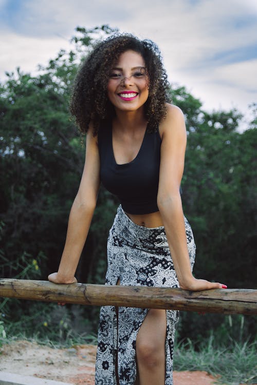 Woman Wearing Black Tank Tops and Gray Floral Asymmetrical Long Skirt