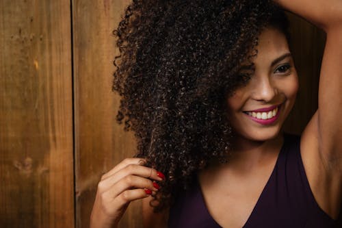 Woman Wearing Black Sleeveless Dress