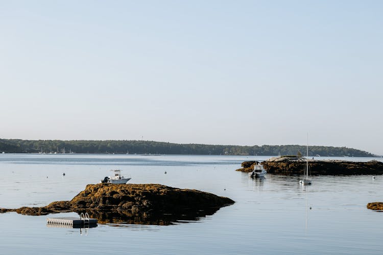 Islands And Boats On Sea