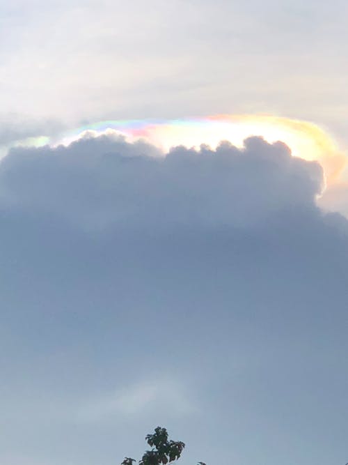 Free stock photo of above clouds, blue sky, cloud iridescence Stock Photo