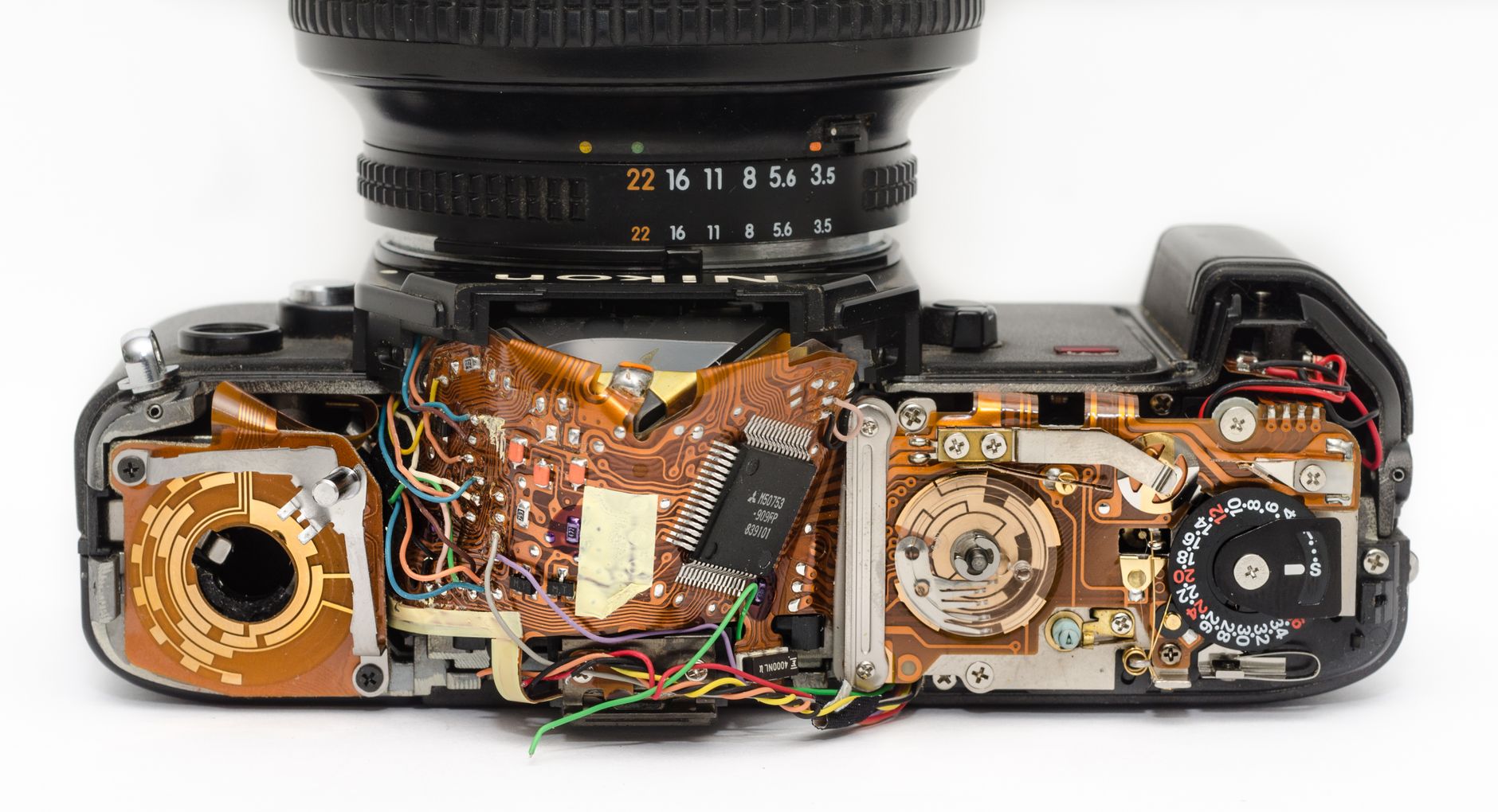 Detailed view of an exposed camera's internal circuitry and electronics components.