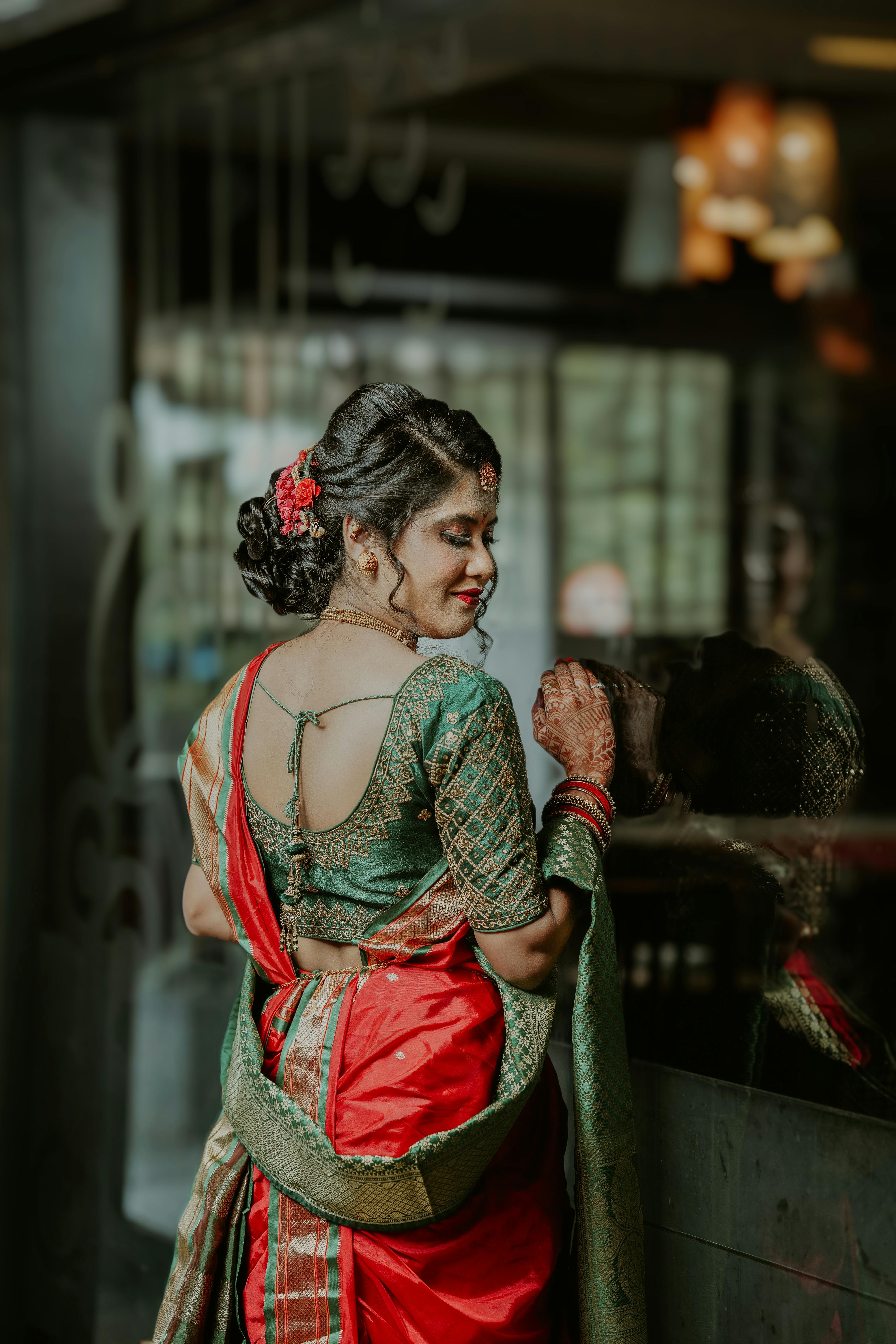 Premium Photo | Attractive girl back pose wearing desi dress holding  dupatta for outdoor shoot with plants