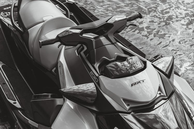 Grayscale Photo Of A Personal Watercraft