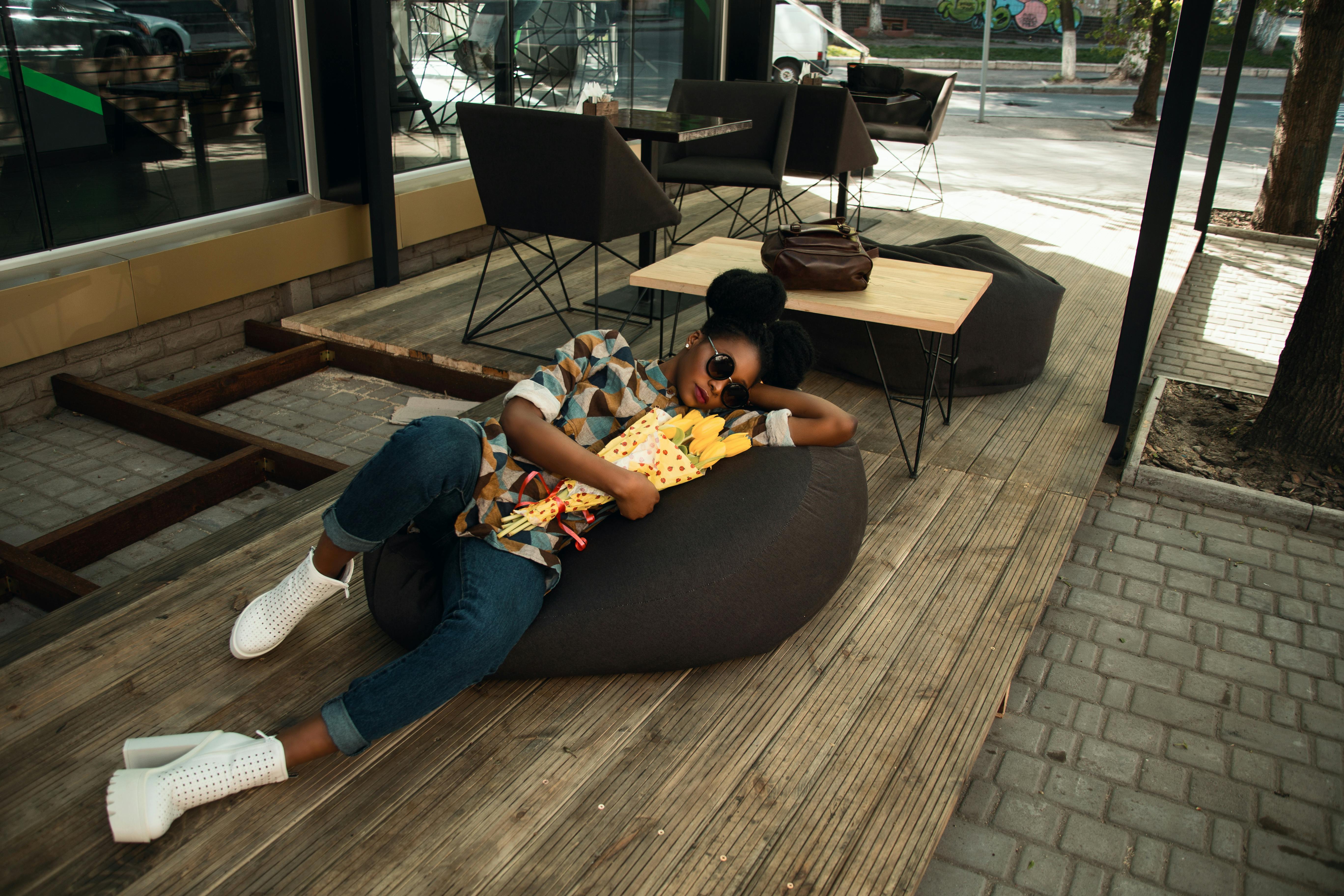 Person Lying on Bean Bag Chair · Free Stock Photo