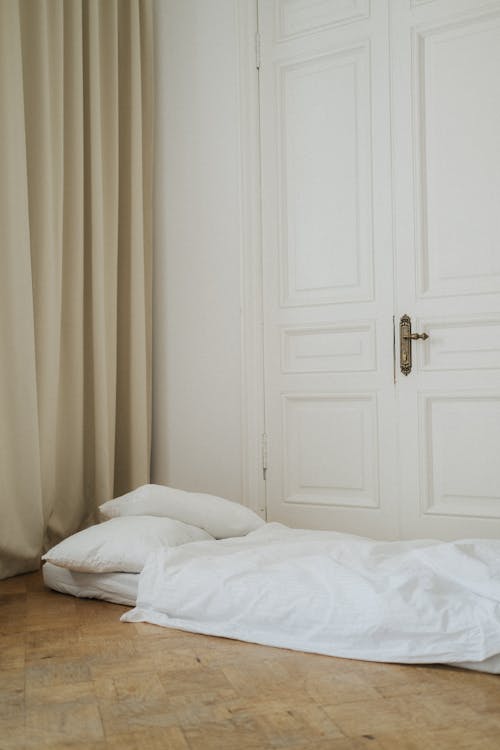 Free A Mattress and Pillows on the Floor Stock Photo