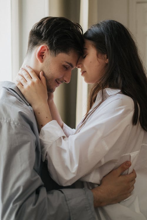 Free An Intimate Couple Close Together Stock Photo
