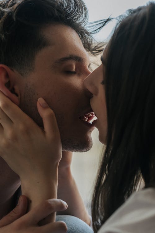 Free Close Up Photo of Couple Kissing Stock Photo