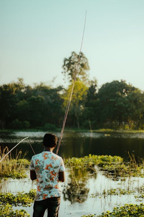 村釣り, 男釣り, 釣り竿の無料の写真素材