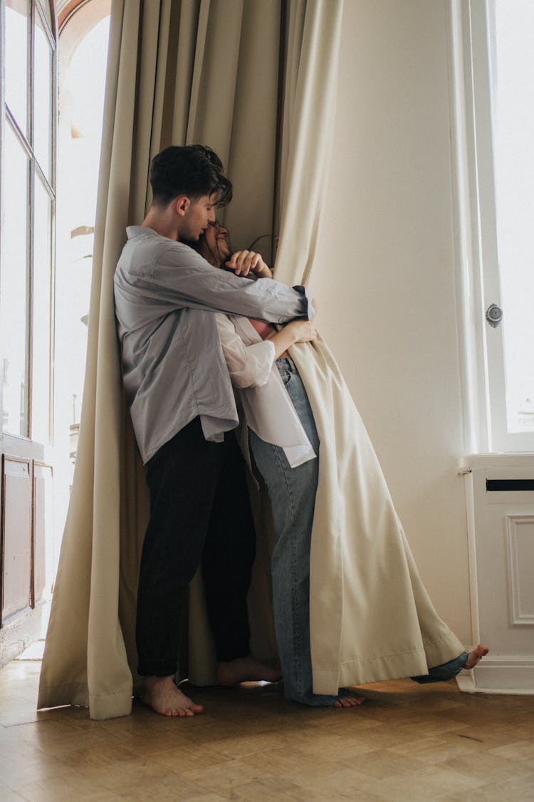 A Man Hugging His Woman