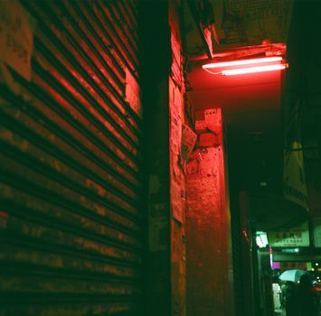 Explore the atmospheric neon-lit alleyway in Kowloon, Hong Kong, showcasing a cyberpunk aesthetic.. explore, atmospheric, neo