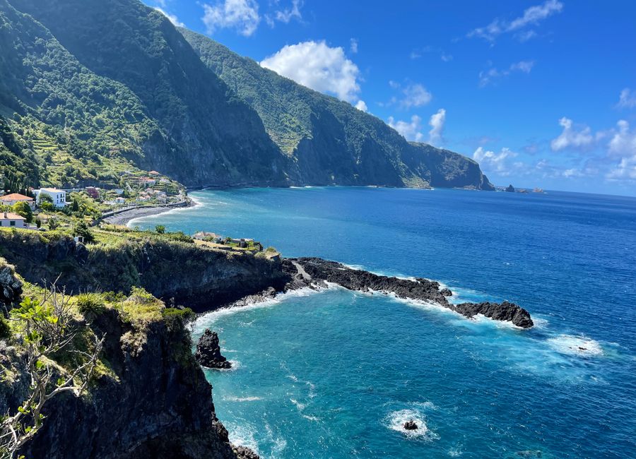 Stunning view of Seixal's cliffs and turquoise waters in Madeira, Portugal.