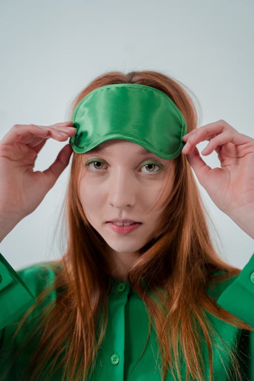 Woman Wearing Pajamas and a Sleep Mask