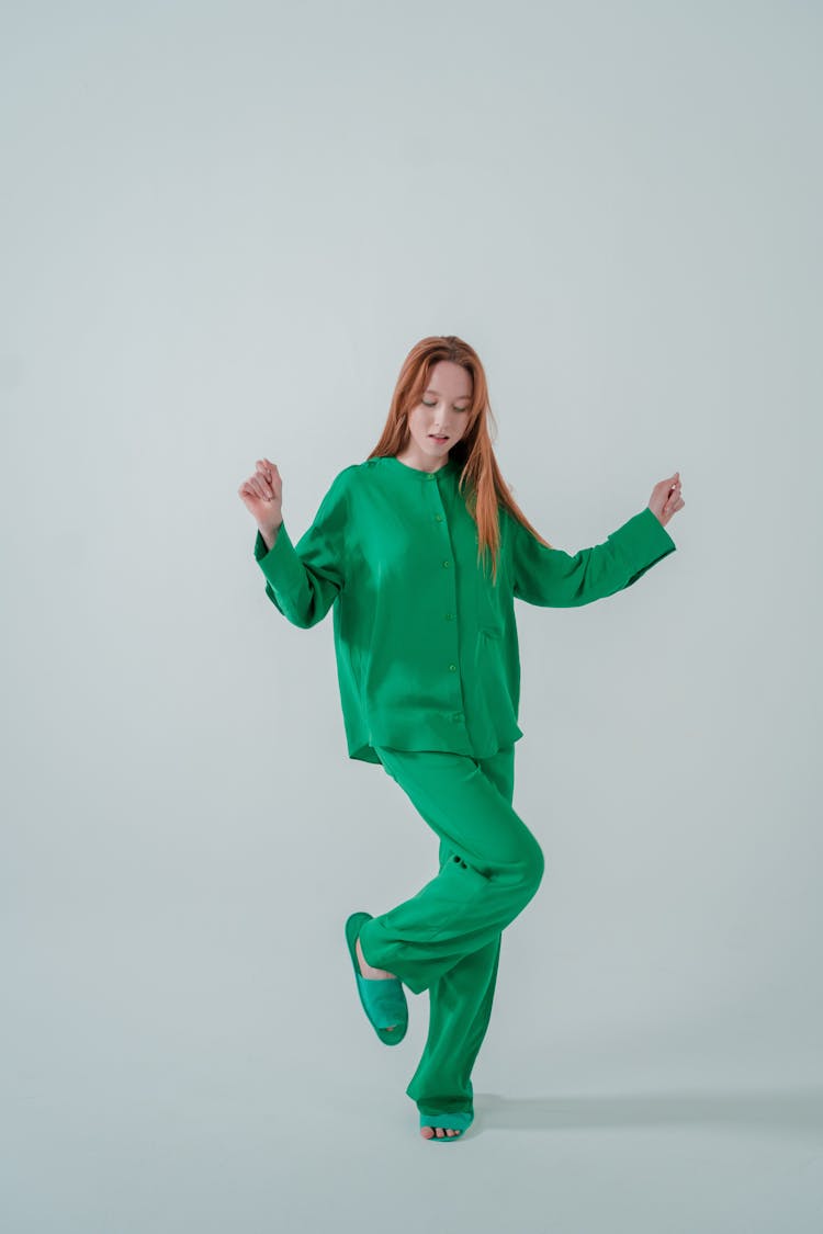 Woman In Green Pajama Dancing