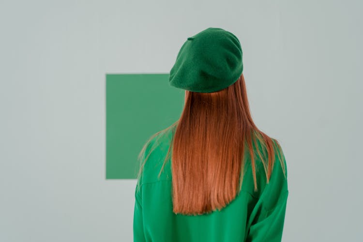 Woman Wearing Green Clothes In Art Gallery 