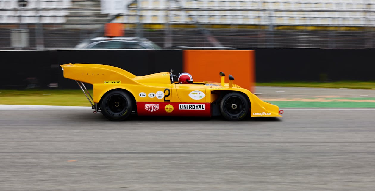 Side View of a Racing Car Moving Fast 